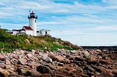 Gloucester Lighthouse Over Rocky Shore